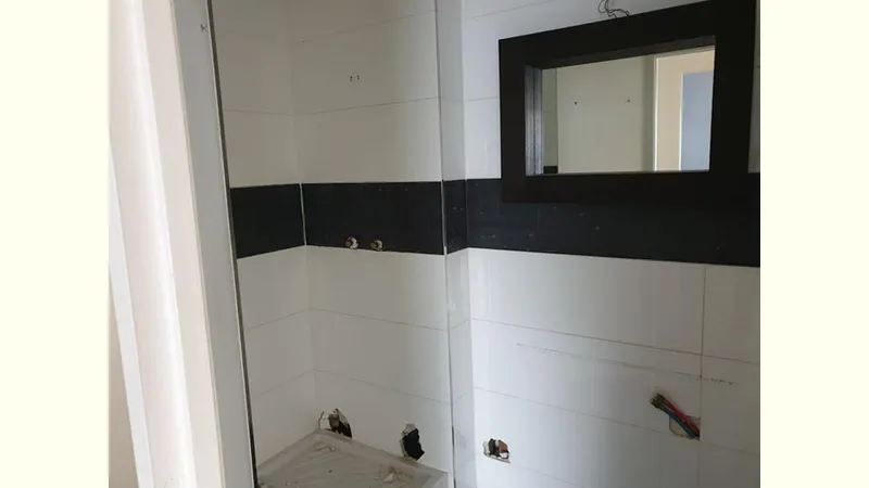Exemple de rénovation de salle de bains — photo 1